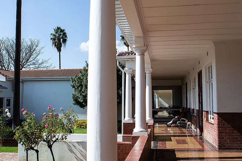 The colonnaded veranda running along the original hospital wing.