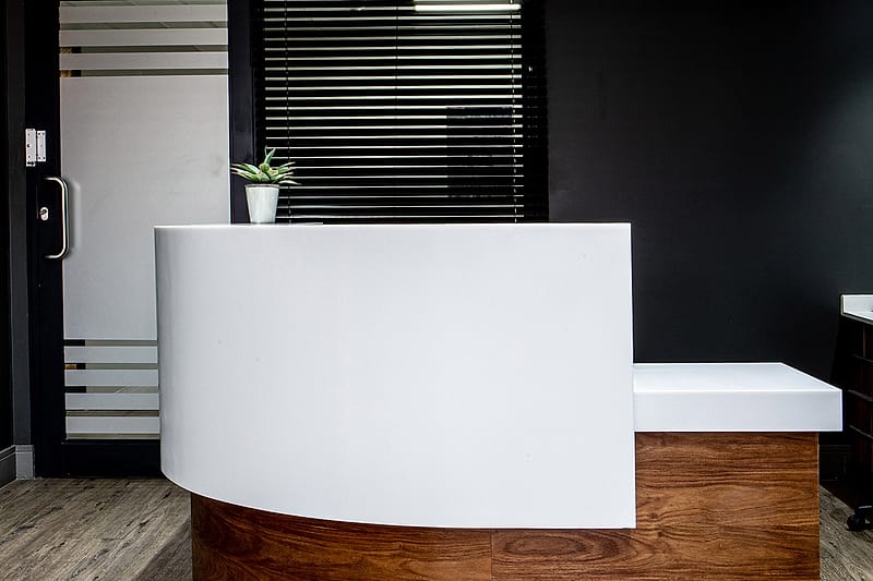 The curved reception desk at the Obesity Health Centre rooms.