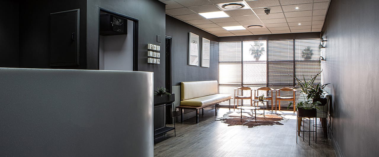 The reception area looking through to the waiting room.